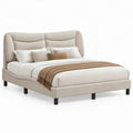 Beige gestoffeerd tweepersoonsbed 180 x 200 cm met gebogen hoofdbord en zwarte stalen poten